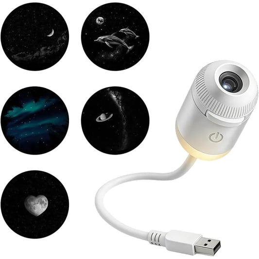 A white portable planetarium projector on a clean background, showcasing five switchable slides including crescent moon, dolphin, and northern lights aurora.
