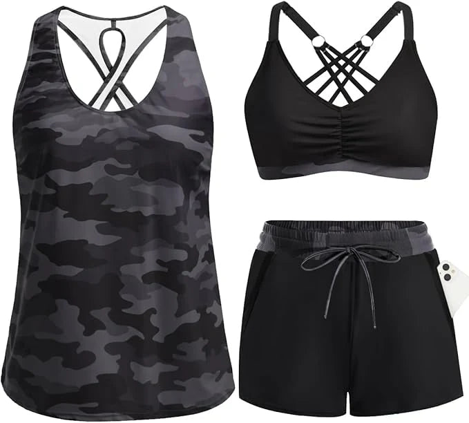 Flat-lay of a sporty 3-piece swimsuit featuring a black and grey camouflage printed tank top, sports bra, and matching swim shorts.
