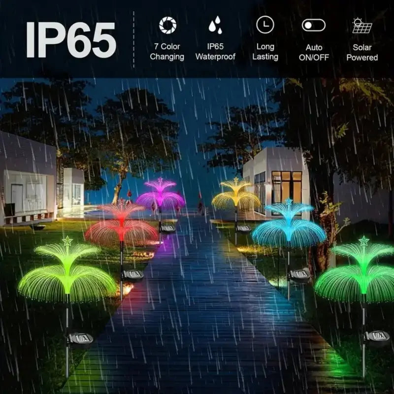 Colorful IP65 waterproof solar jellyfish lights illuminating a garden walkway in a heavy rainstorm.